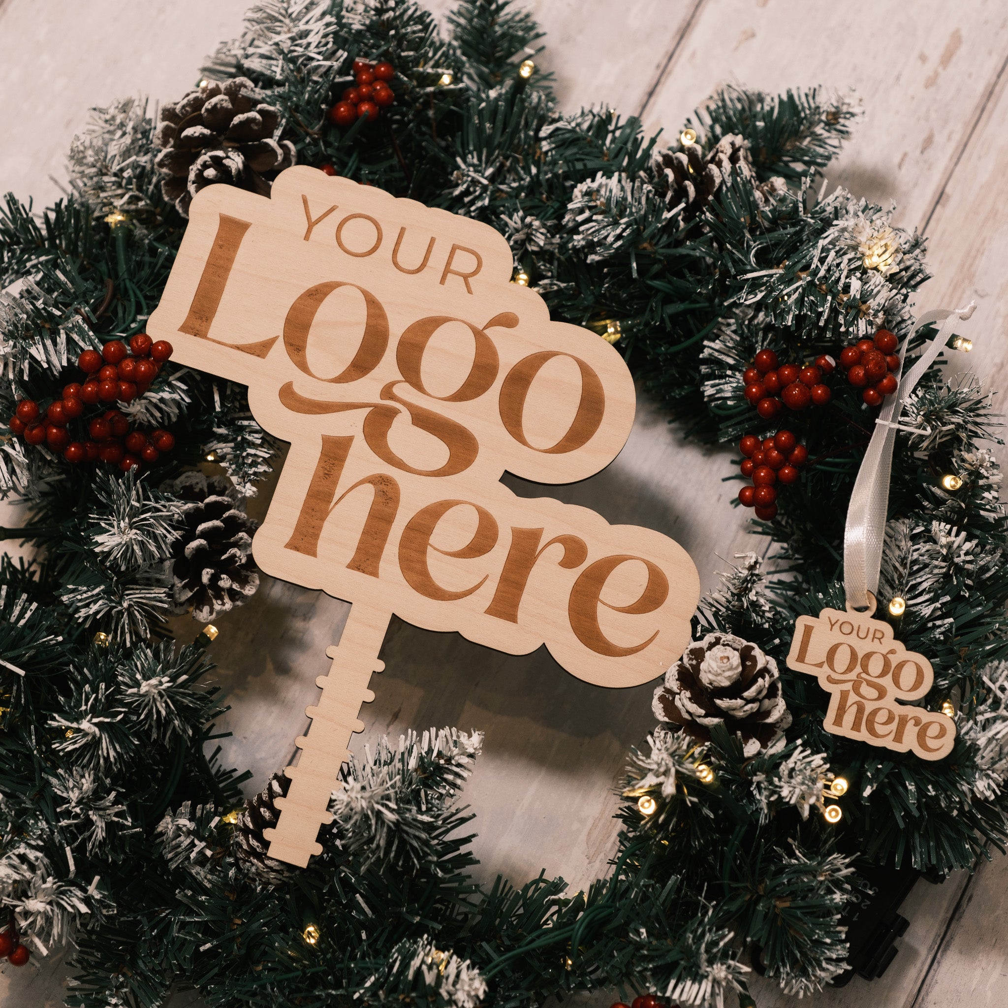 festive tree toppers and branded logo bauble